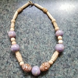 Carved necklace 18" long.